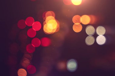 defocused street lights at night on the street 