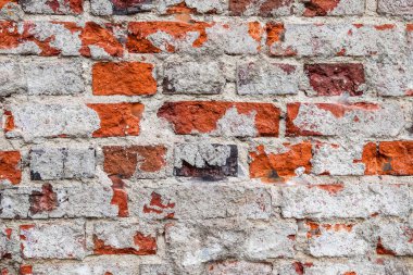 Yüksek çözünürlüklü eski ve yıpranmış tuğla duvarların detaylı görüntüsü.