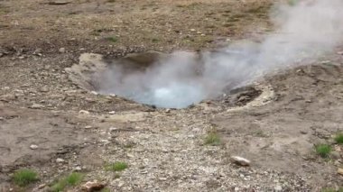 Steaming hot springs on the volcanic sulphur fields of Iceland.