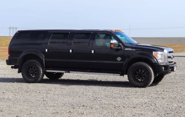 Jokulsarlon, Iceland - 23. June 2022: Side view of a huge black Ford F350 supertruck on a parking area