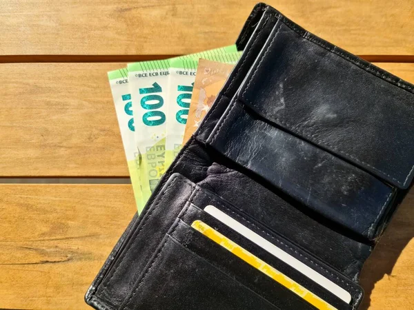 Black Leather Wallet Containing Several 100 Euro Banknotes — Stockfoto