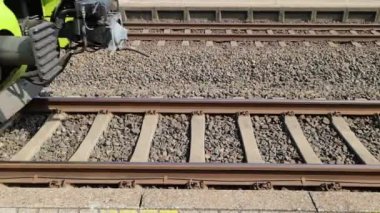 Bordesholm, Germany - 02. August 2022: Side view at a train stopping in the railway station of Bordesholm in Germany