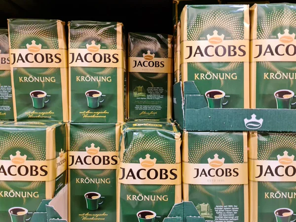 Kiel,Germany - 20 August 2022: Numerous packages of Jacobs brand coffee on a supermarket shelf