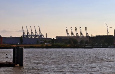 Hamburg, Germany, 27 August 2022, Beautiful view at the port of Hamburg with ships and people on a sunny summer day