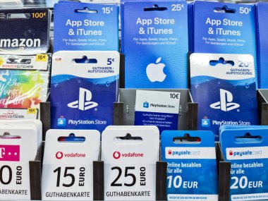 Kiel, Germany - 03. September 2022: A lot of credit and gift cards from Playstation, Xbox, Vodafone, Alditalk and Amazon in a supermarket