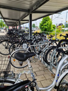 Kiel, Germany - 03. September 2022: Bicycles at a parking space close to a railway station