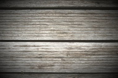 Tahta kütükleri ve yüksek çözünürlüklü ahşap duvarları gösteren farklı ahşap yüzeylerin detaylı yakın görüntüsü