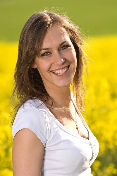 Young woman standing in a rare — Stock Photo, Image