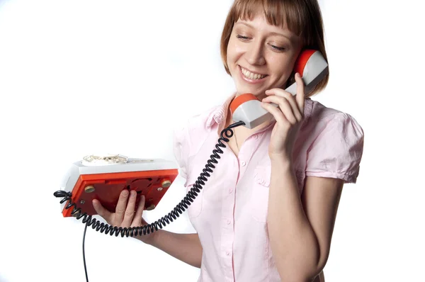 Young girl talking on old phone — Stock Photo, Image