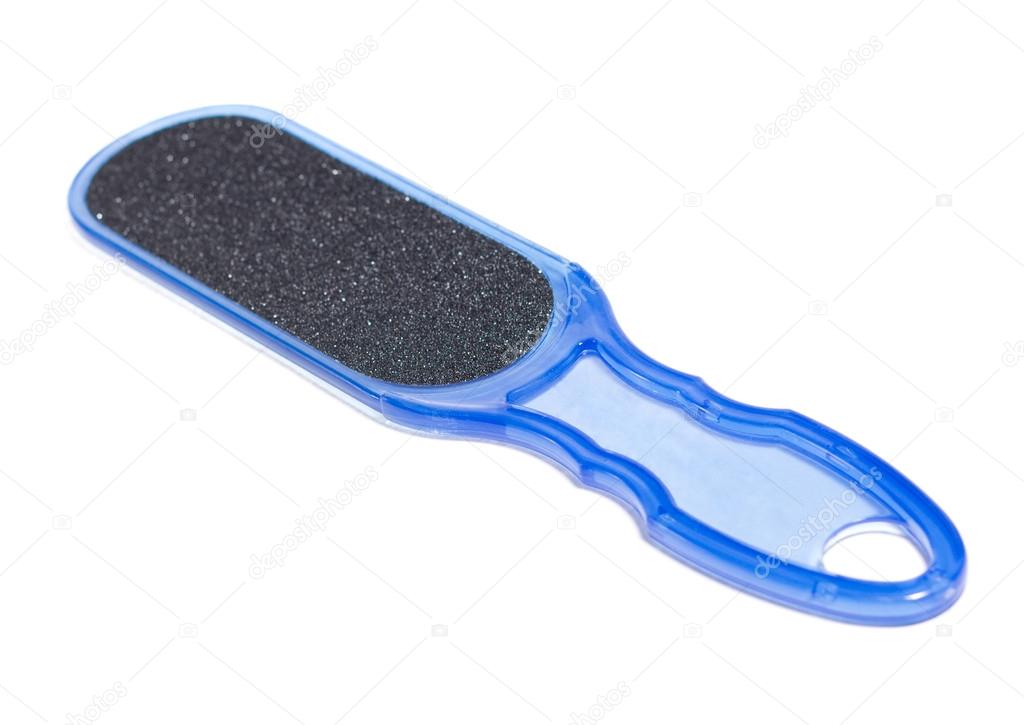 Plastic grater for your feet, tool for the manicure and pedicure, on a white background.