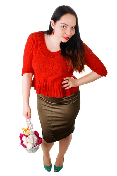 Portrait of beautiful female holding basket with Easter eggs isolated on white background — Stock Photo, Image