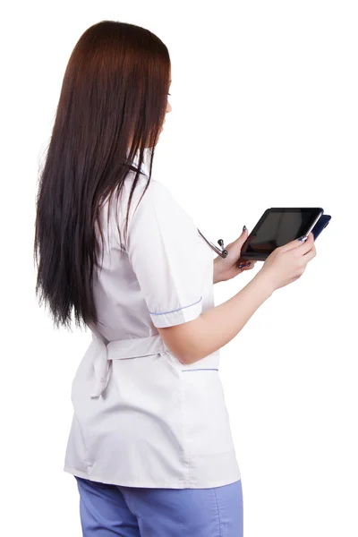 Medicinsk flicka arbetare med elektroniska tablett i händer — Stockfoto