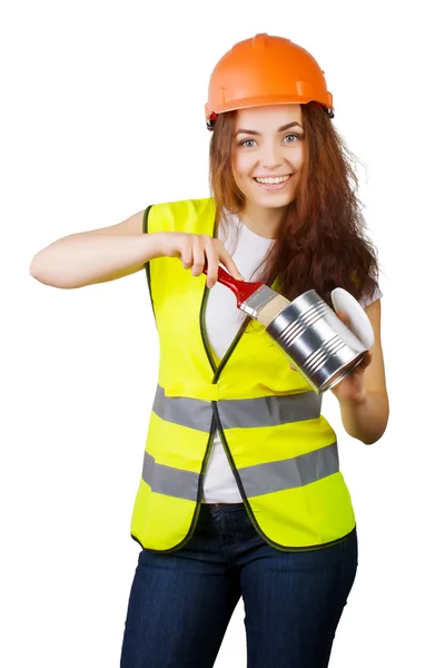Girl in a helmet and vest holding a brush and a metal can of paint. — Stock Photo, Image