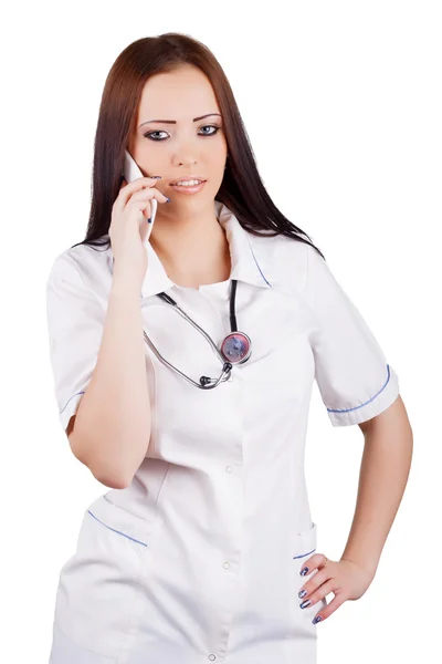 Jovem médico mulher falando no telefone móvel . — Fotografia de Stock