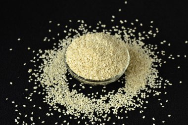White sesame seeds in a glass vessel