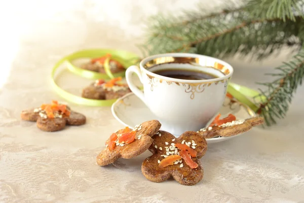 Christmas cookies, decorated with sesame seeds and dried apricots — Stock Photo, Image