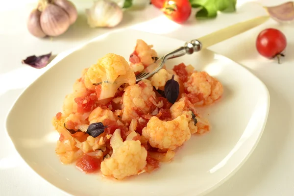 Cauliflower with tomato sauce — Stock Photo, Image