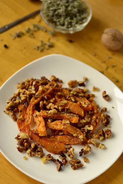 Baked pumpkin with walnuts — Stock Photo, Image