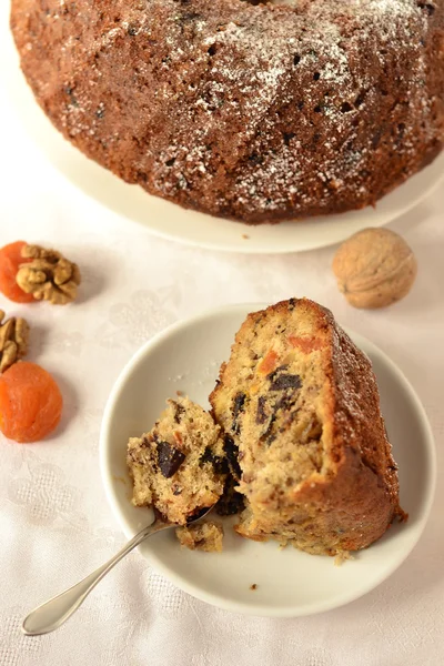 Pudim com frutas secas, nozes, cupcake — Fotografia de Stock