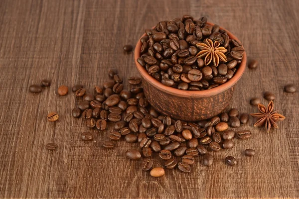Coffee beans in a ceramic bowl — Stock Photo, Image