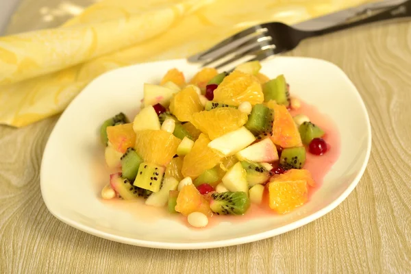 Fruit salad in a white plate — Stock Photo, Image