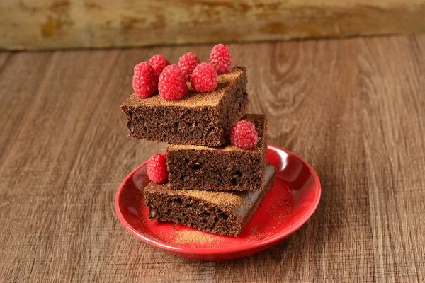 Brownie with raspberries, chocolate cake