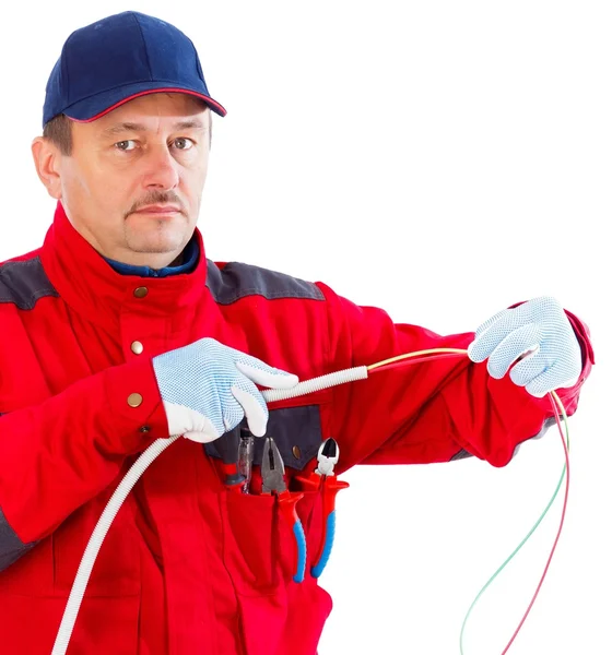 Plugging cable in tube — Stock Photo, Image