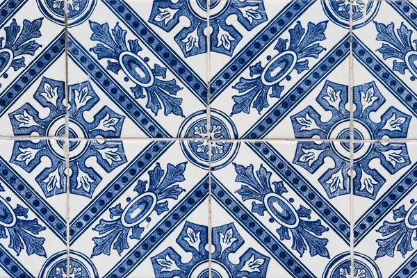 Azulejos in Portugal, detail on a typical house, blue color
