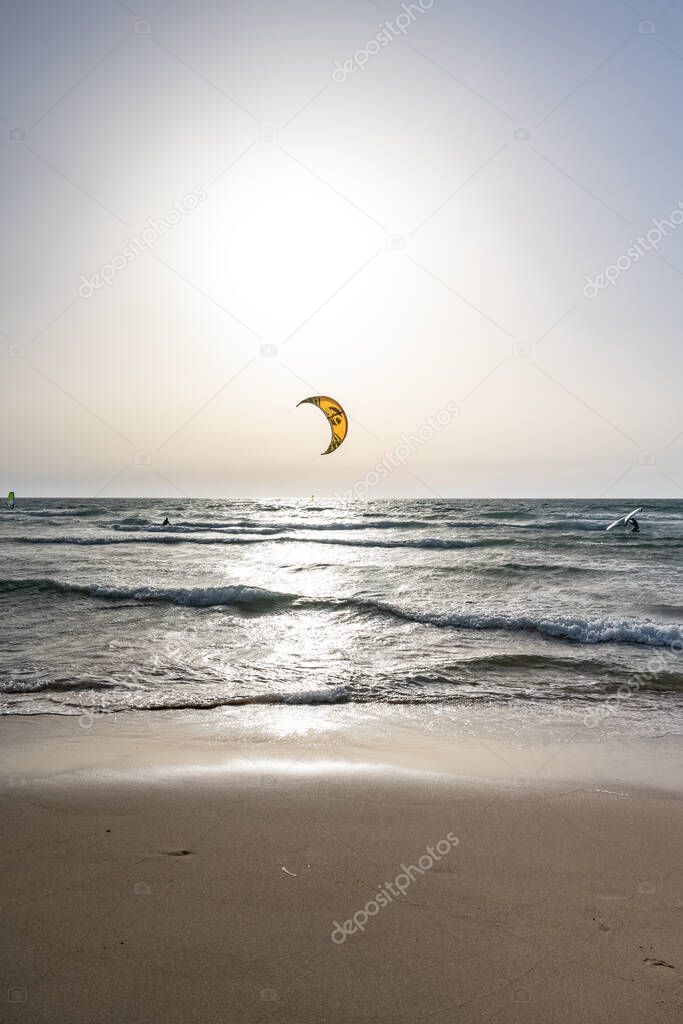 Portugal, the praia do Guincho on the Atlantic coast, windy beach with kitesurfer