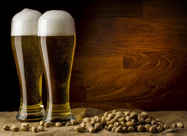 Two glass beer on wood background with copyspace — Stock Photo, Image