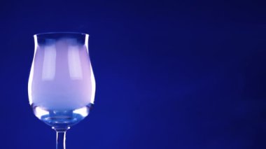 Glass goblet with smoke inside