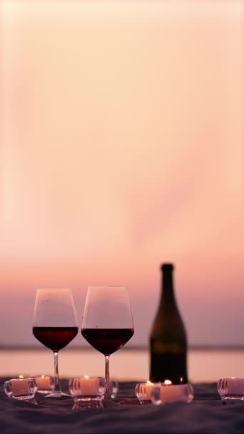 Wine Glasses Bottle Candles Sunset — Stockvideo
