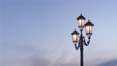Ancient pole with Venetian lights