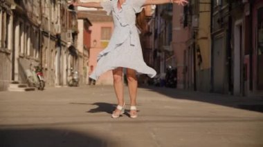Woman turns happy in Venice in the summer sun