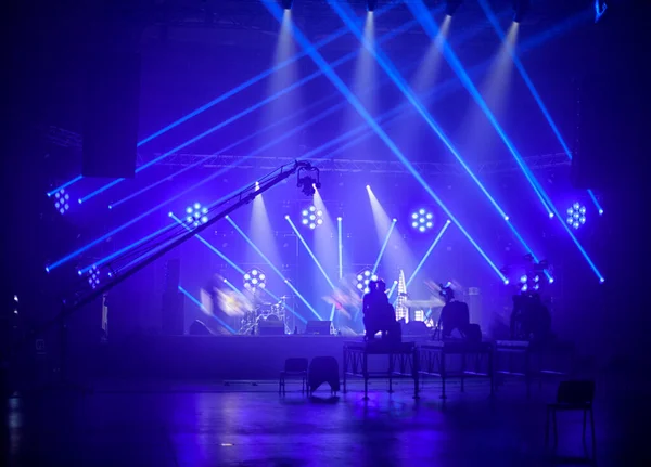 rays of light on stage in a concert hall