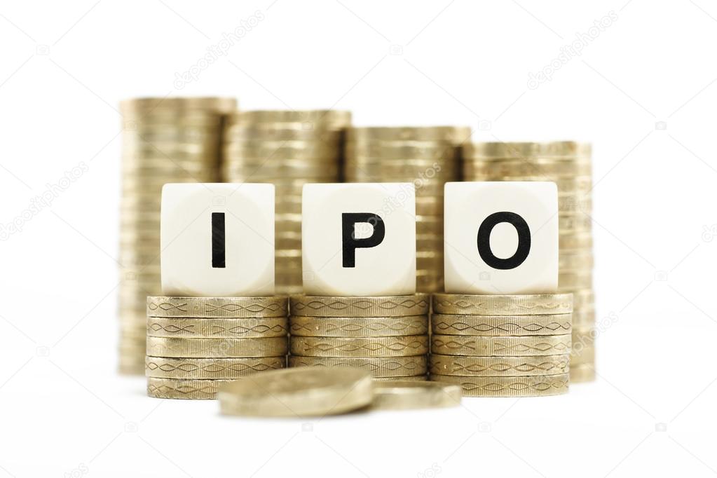 IPO (Initial Public Offering) on coin stacks with white backgrou