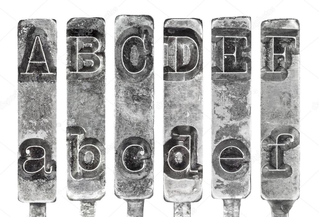 Old Typewriter Typebar Letters A to F Isolated on White