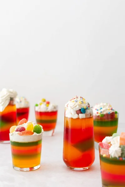 Glasses with multi-colored jelly — Stock Photo, Image