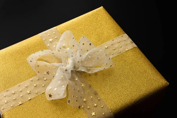 Gift Box Golden Wrapper Bow Close Black Background — Stock Photo, Image