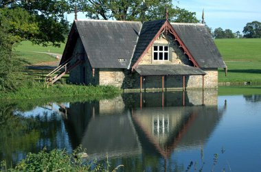 Boat house on a Golf Course in County Kildare Ireland clipart