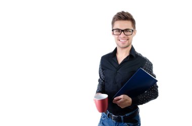 Yakışıklı bir genç. Laptop ve tabletli öğrenci.
