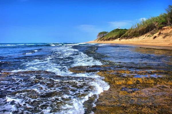 Fala działa na plaży — Zdjęcie stockowe