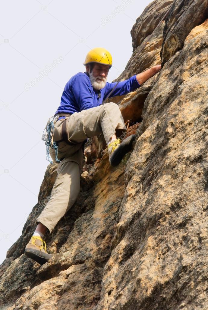 Senior climber in action