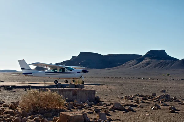 Small private airplane in desert