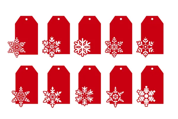 Kerstcadeaulabels of cadeauetiketten met sneeuwvlokken. Vector decoratieve elementen. Silhouetten van korting prijskaartjes voor de herfst of winter verkoop. Tag stencils voor plotter, papier snijden of lasersnijden — Stockvector