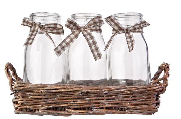 Empty milk bottle in the basket — Stock Photo, Image