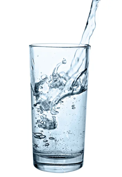 Agua vertida en vidrio —  Fotos de Stock