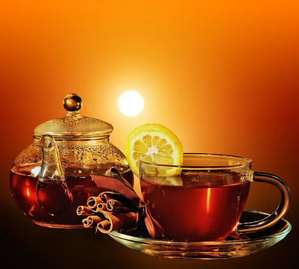 Cup of tea at sunset — Stock Photo, Image