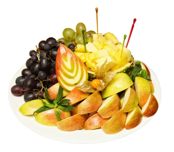 Dojrzałe owoce tropikalne i plastry i szkła z sokiem — Zdjęcie stockowe