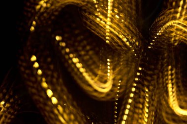 Özet sarı altın ışık çizgileri arkaplan, dinamik modern resim kopyalama alanı ile.